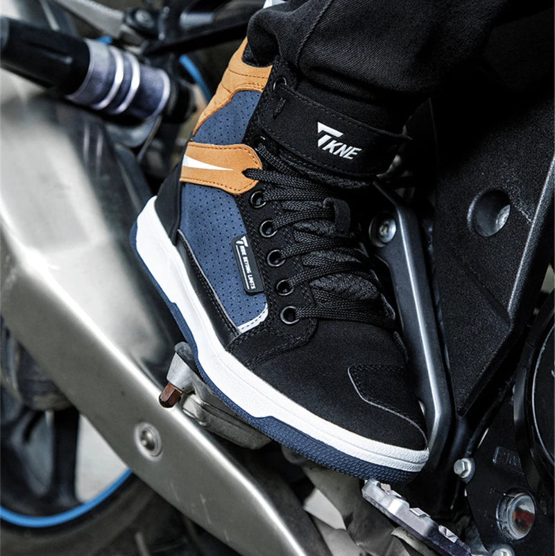 Black and blue sneaker with brown accents on a motorcycle