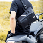 Person sitting on a motorcycle with a black crossbody bag, text 'Instantly transformed crossbody bag' on the left.